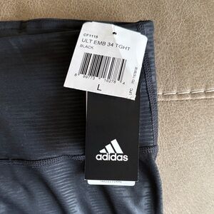 Women’s Adidas mid-rise tights with Climalite technology